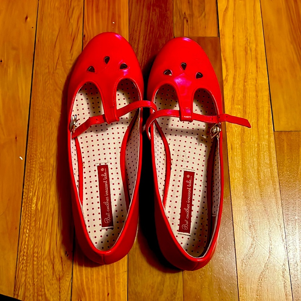 Red dressy flats in vegan leather